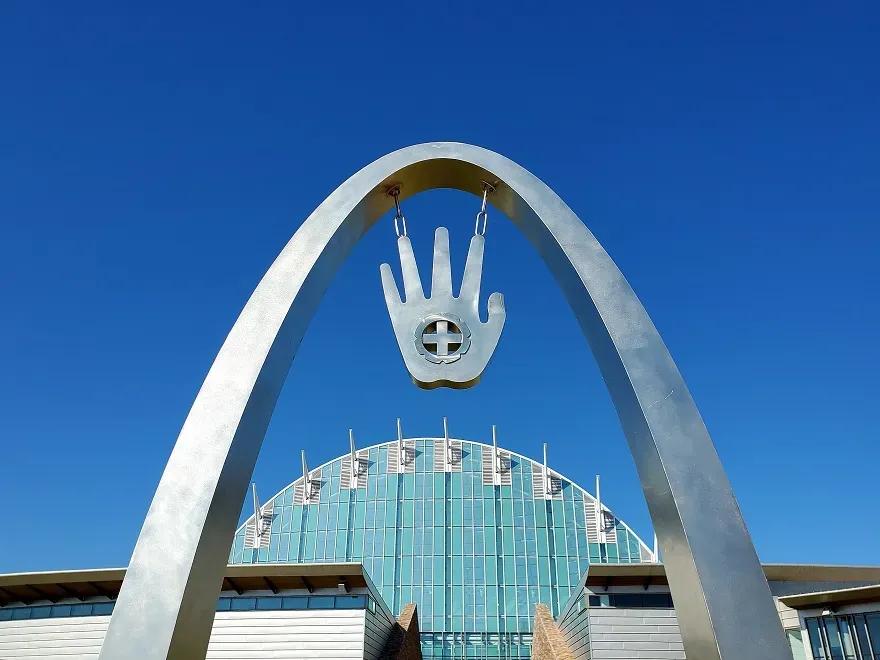 Entrance arch to First Americans Museum Oklahoma City United States with hanging hand sculpture