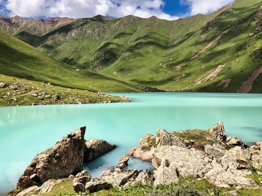 Aerial view of Kol Tor Lake turquoise waters