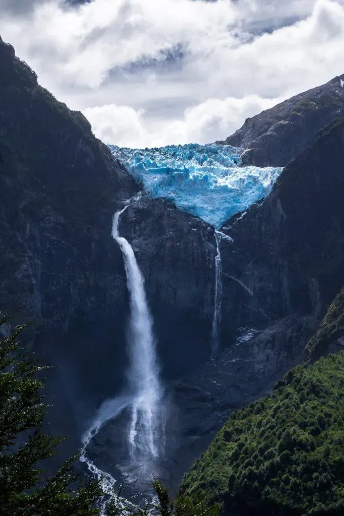 Close-up view of the Ventisquero Colgante hanging glacier descending from snowy peaks