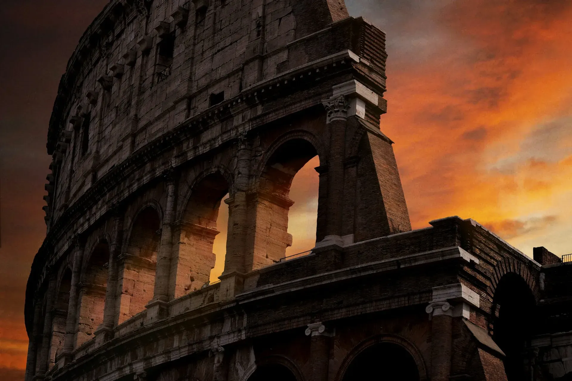 Colosseum during golden hour with warm sunset light