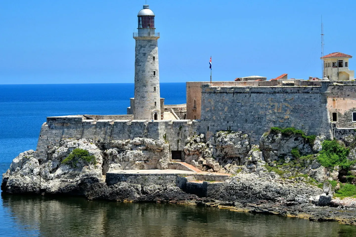 El Morro fortress lighthouse against a clear blue sky showing historic architecture