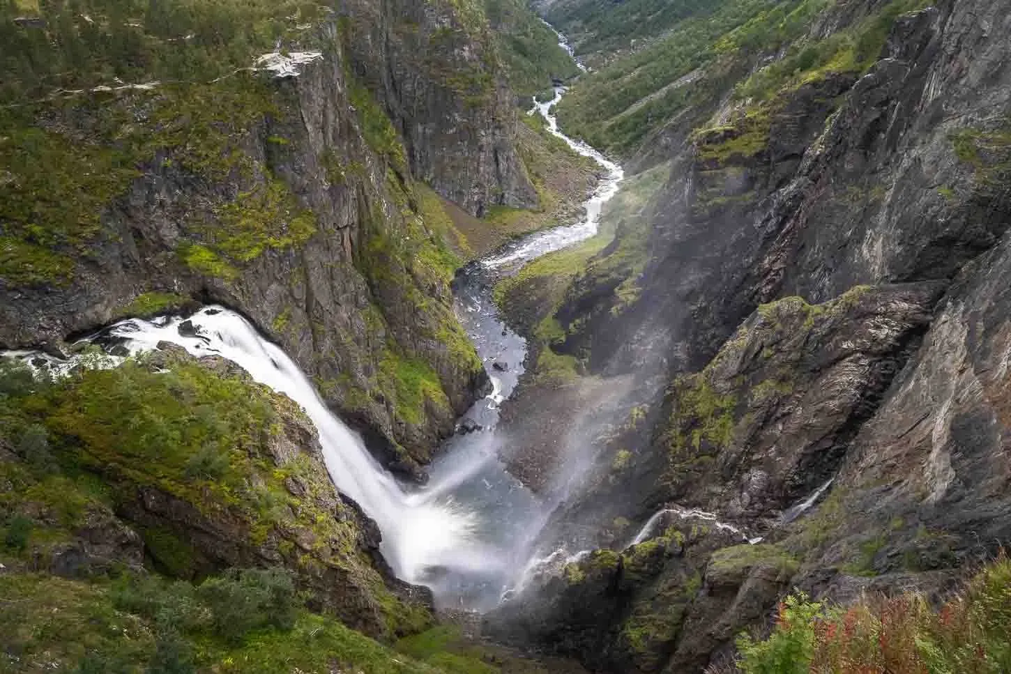 Long exposure photograph of Vøringsfossen showing silky water flow and mist