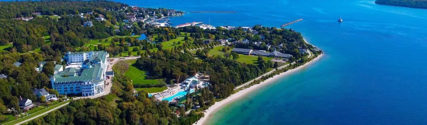 The Grand Hotel Mackinac Island Michigan with its distinctive porch overlooking lush green landscapes