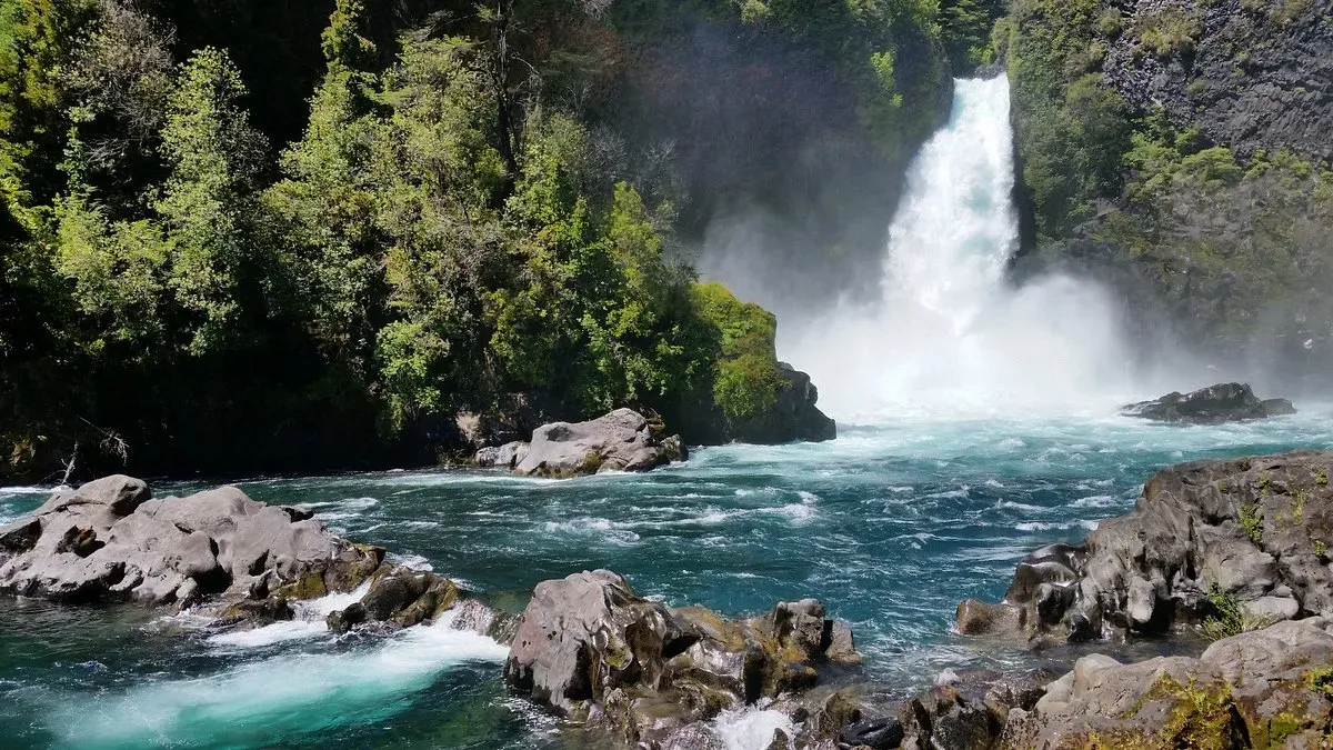 Salto Huilo Huilo waterfall cascading into turquoise water