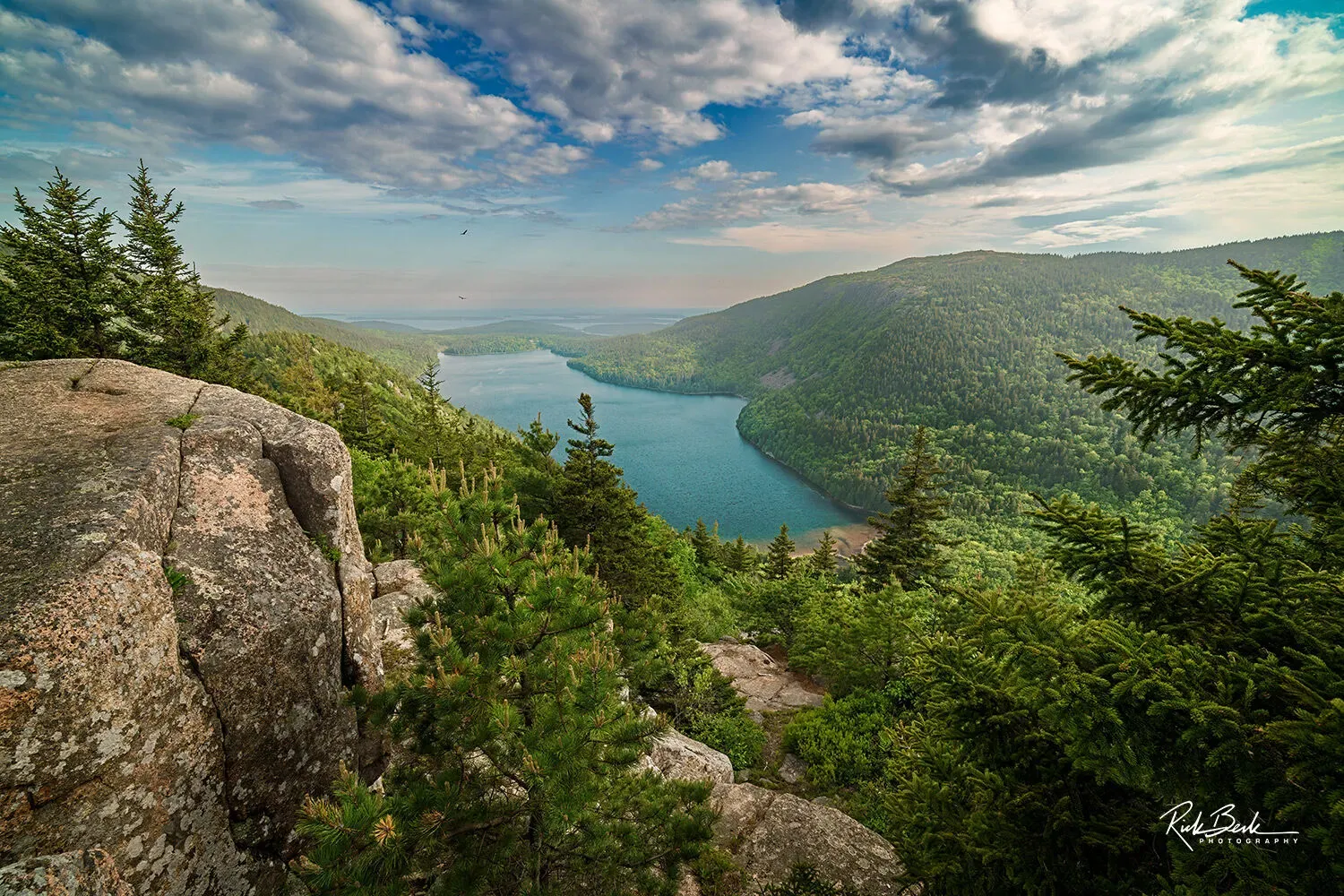 Jordan Pond surrounded by forested hills in Acadia National Park United States