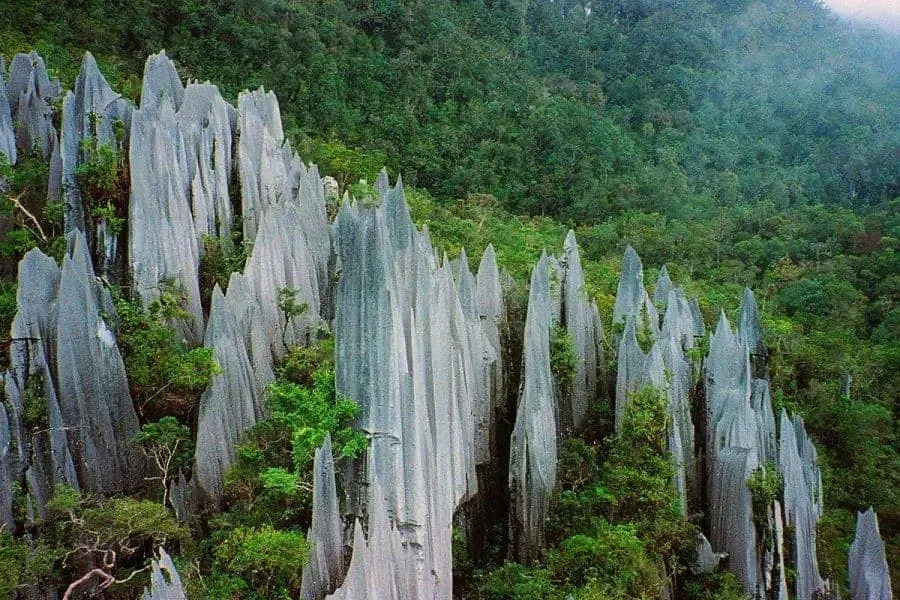Jagged limestone pinnacles against bright sky