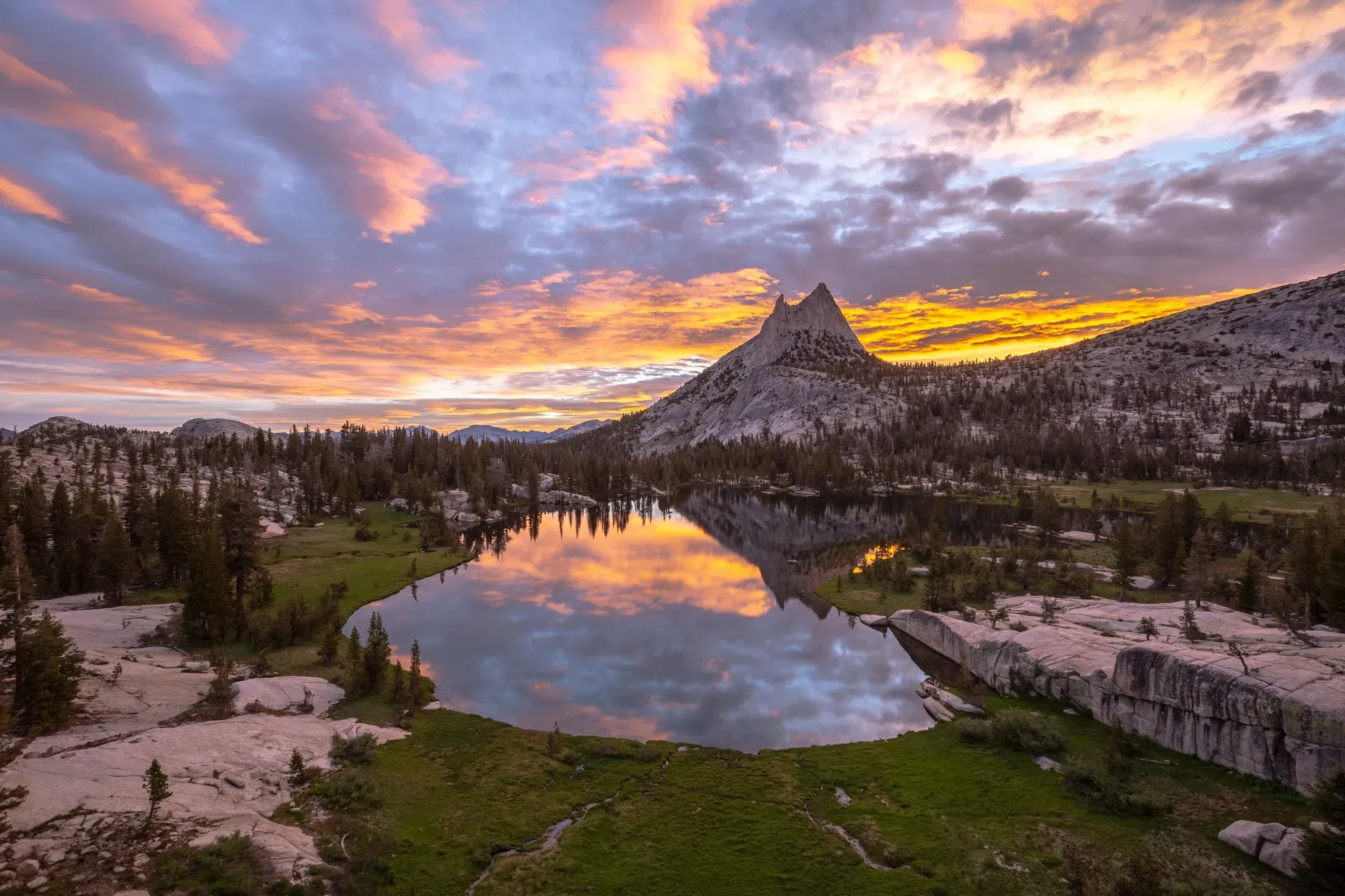 Yosemite National Park United States sunrise over Half Dome reflected in Merced River
