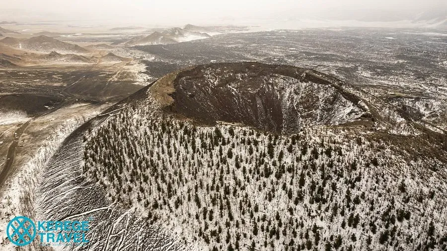 View from the ridge of Khorgo Volcano in Mongolia showing the wide volcanic depression