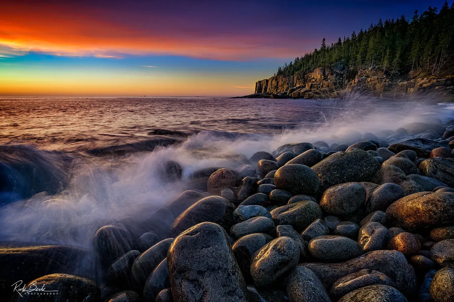 Waves crashing at Boulder Beach during sunrise in Acadia National Park United States