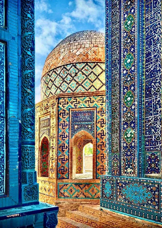 Colorful tiled arches and turquoise domes with geometric and floral patterns at Shah-i-Zinda