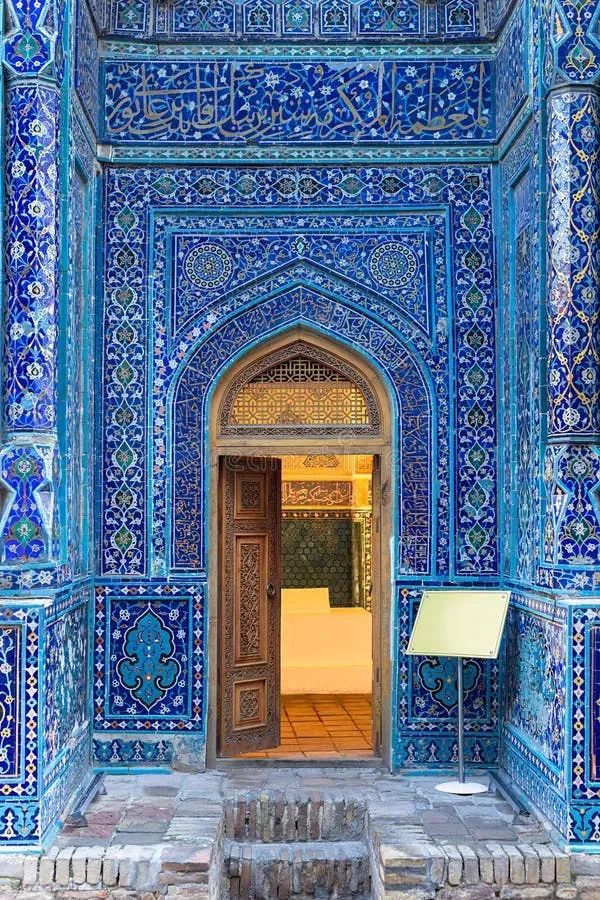 Entrance doorway at Shah-i-Zinda with blue tile patterns and geometric designs