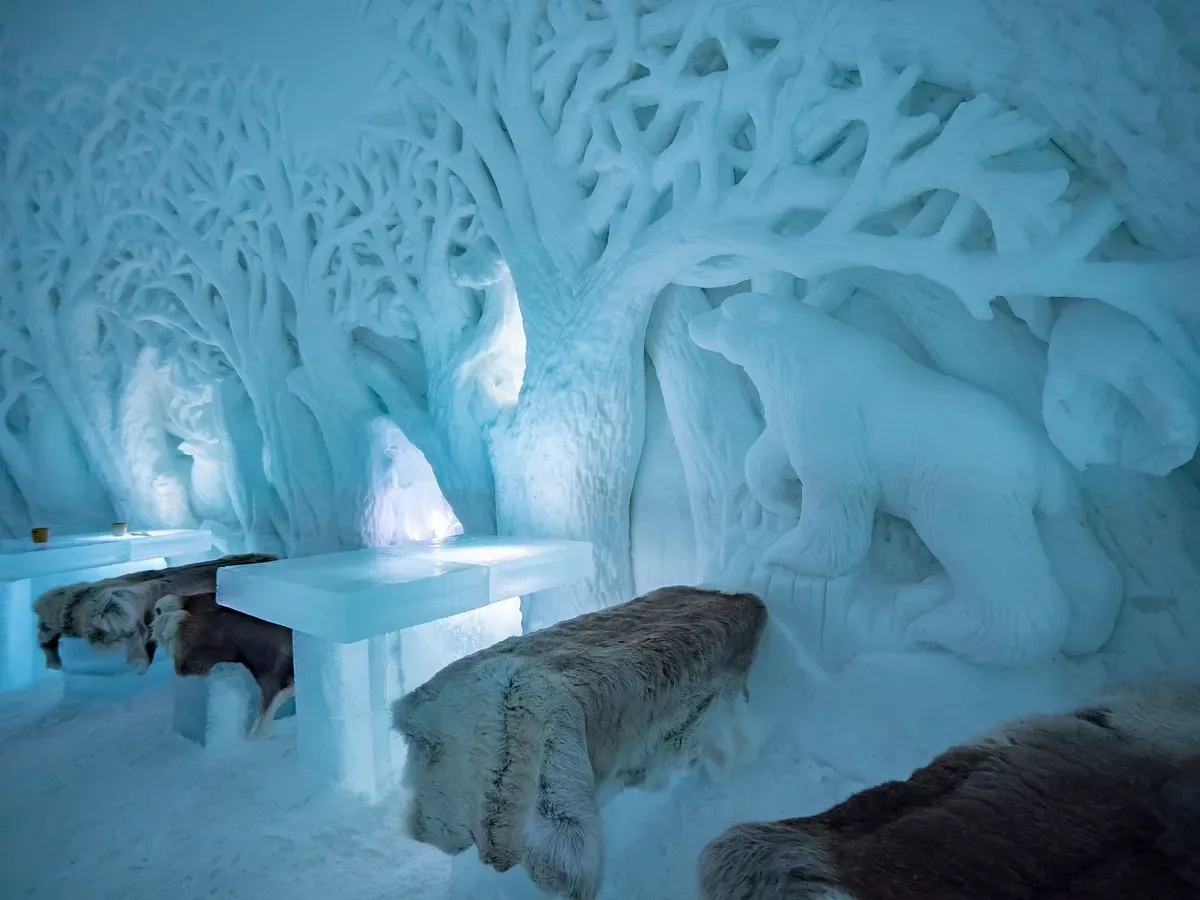 Ice carvings of trees and polar bear inside Tromsø Ice Domes Norway
