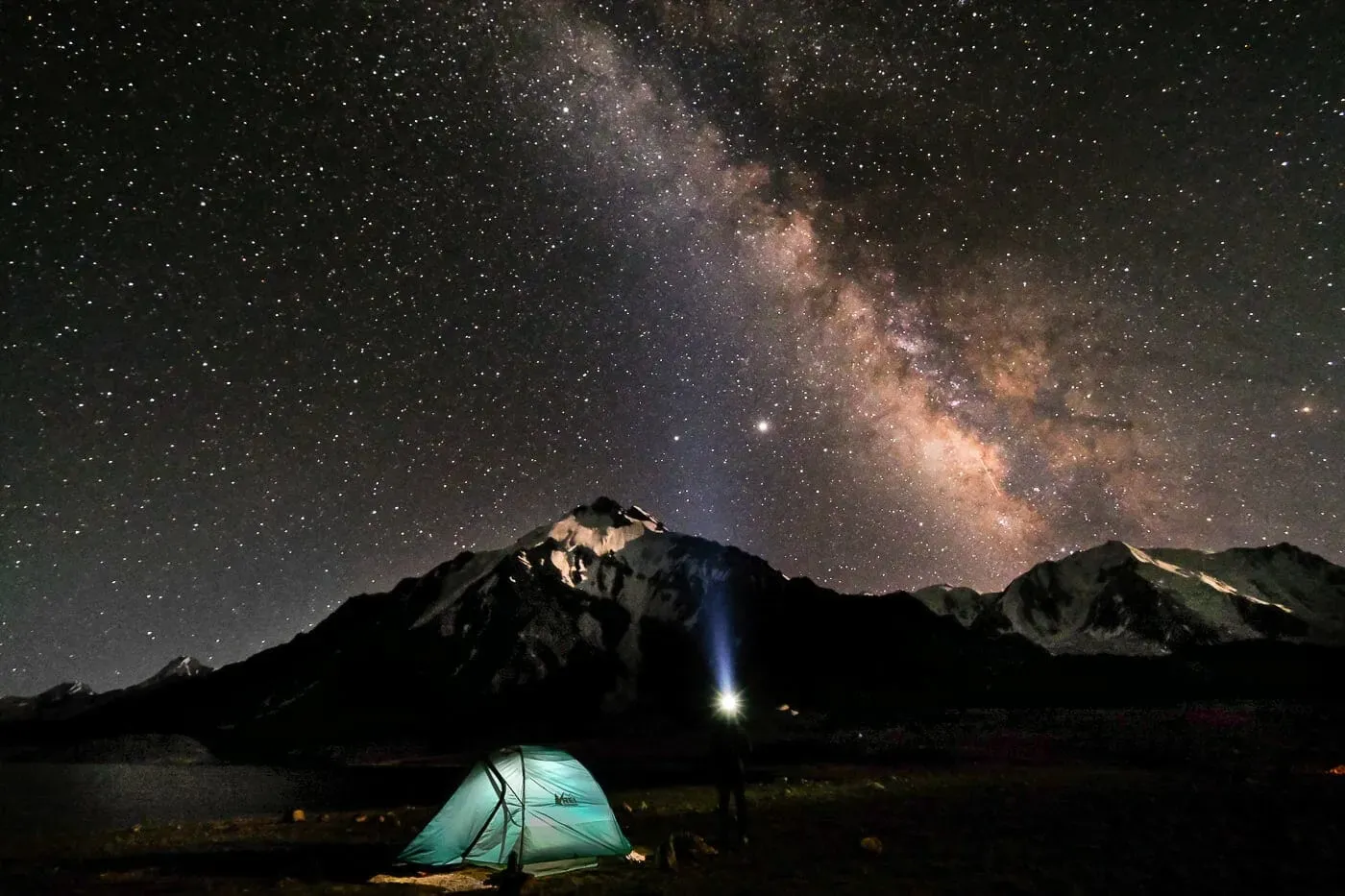 Milky Way galaxy over a tent at Karambar Lake