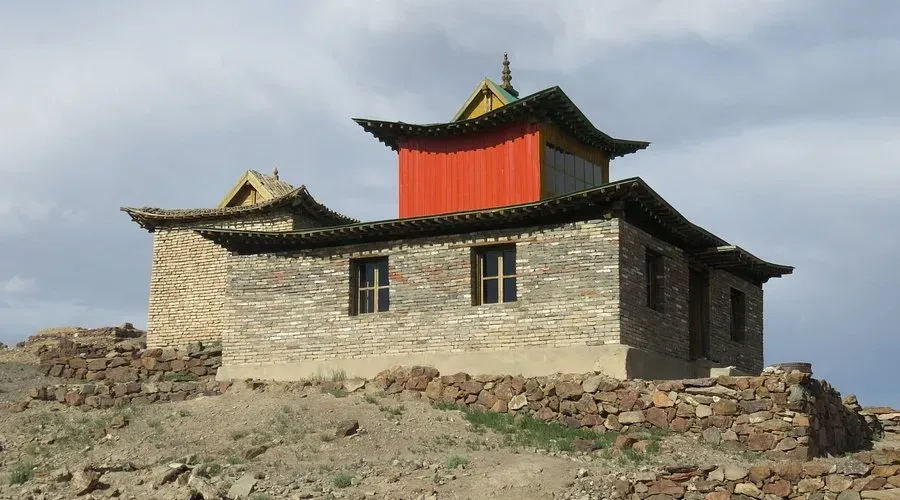 Restored traditional Mongolian Buddhist temple on a rocky hilltop at Ongi Monastery