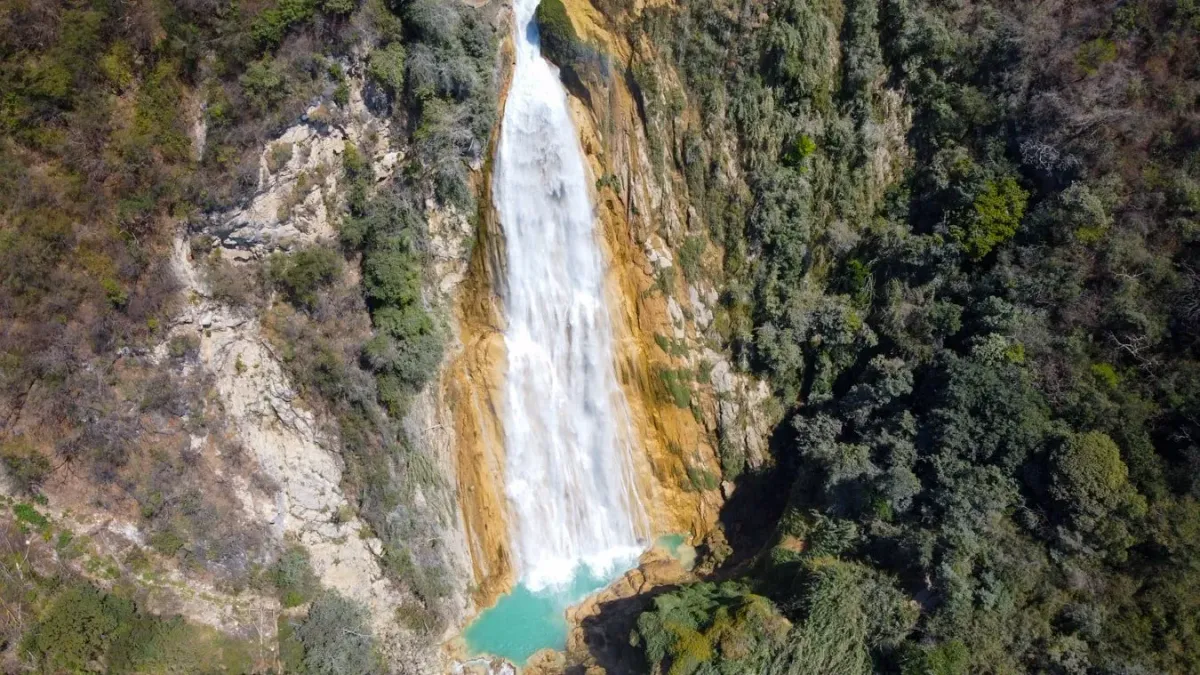 Aerial drone view of the towering 120-meter Cascada Velo de Novia Bridal Veil waterfall at El Chiflón