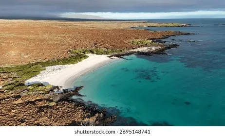 Aerial view of the Galapagos Islands Ecuador showing volcanic landscapes, turquoise waters, and vegetation