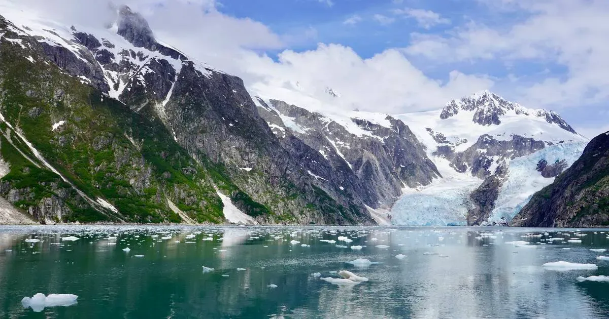Panoramic view of Kenai Fjords Alaska with snow-capped mountains and tidewater glaciers