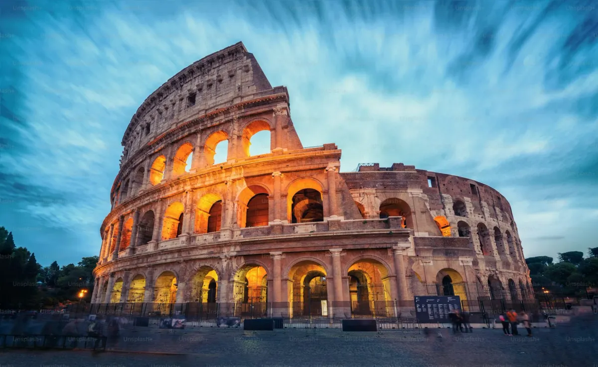 The Colosseum in Rome Italy at golden hour with dramatic lighting
