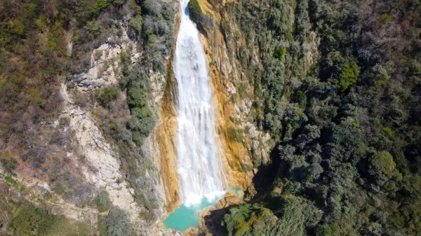 Aerial drone view of the towering 120-meter Cascada Velo de Novia Bridal Veil waterfall at El Chiflón