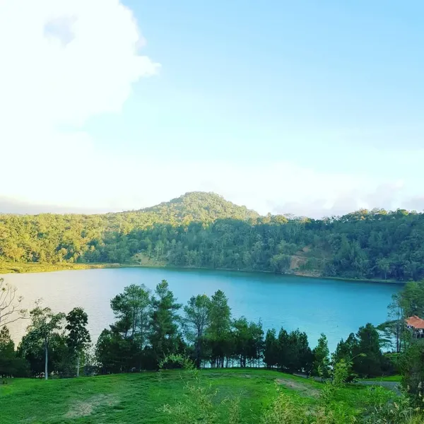 Turquoise and emerald waters of Lake Linow, a color-shifting volcanic crater near Tomohon in North Sulawesi, Indonesia