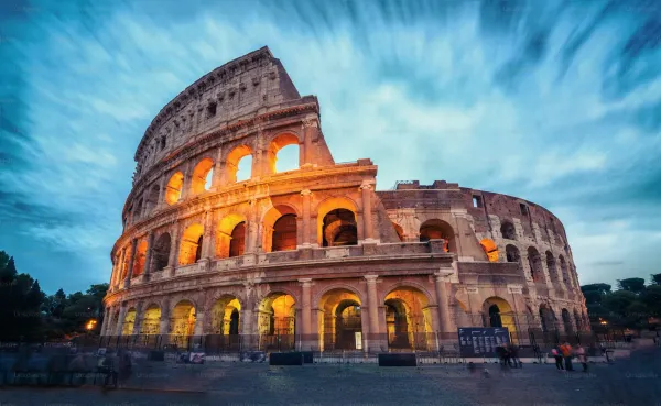 The Colosseum in Rome Italy at golden hour with dramatic lighting