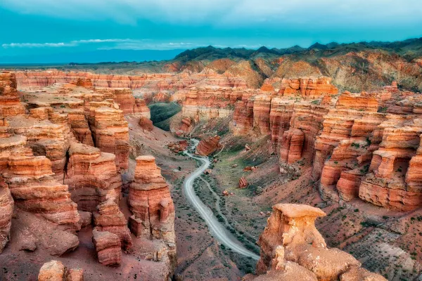 Winding road through dramatic red rock formations of Charyn Canyon Kazakhstan